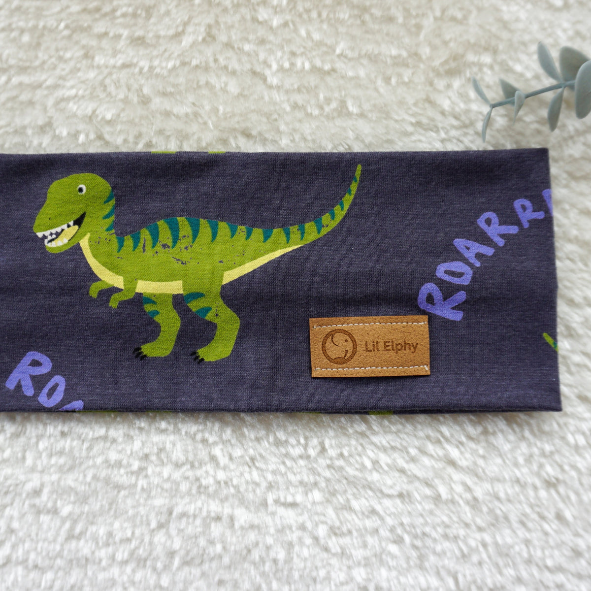 Naglavni trak – dinozaver